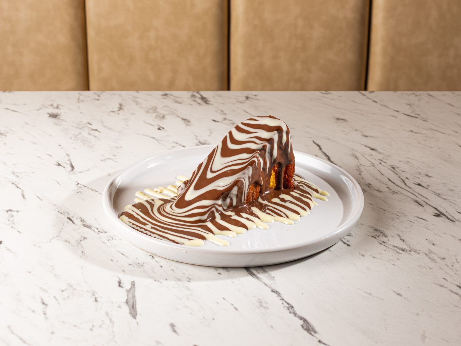 Zebra-drip San Sebastian cake